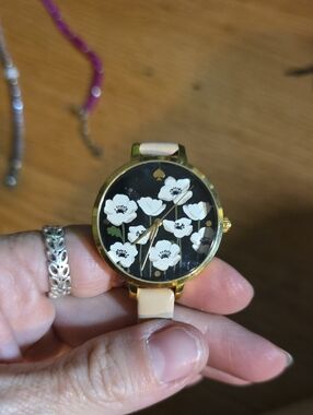 kate spade Black Floral Dial Watch with Cream Strap and Gold Case